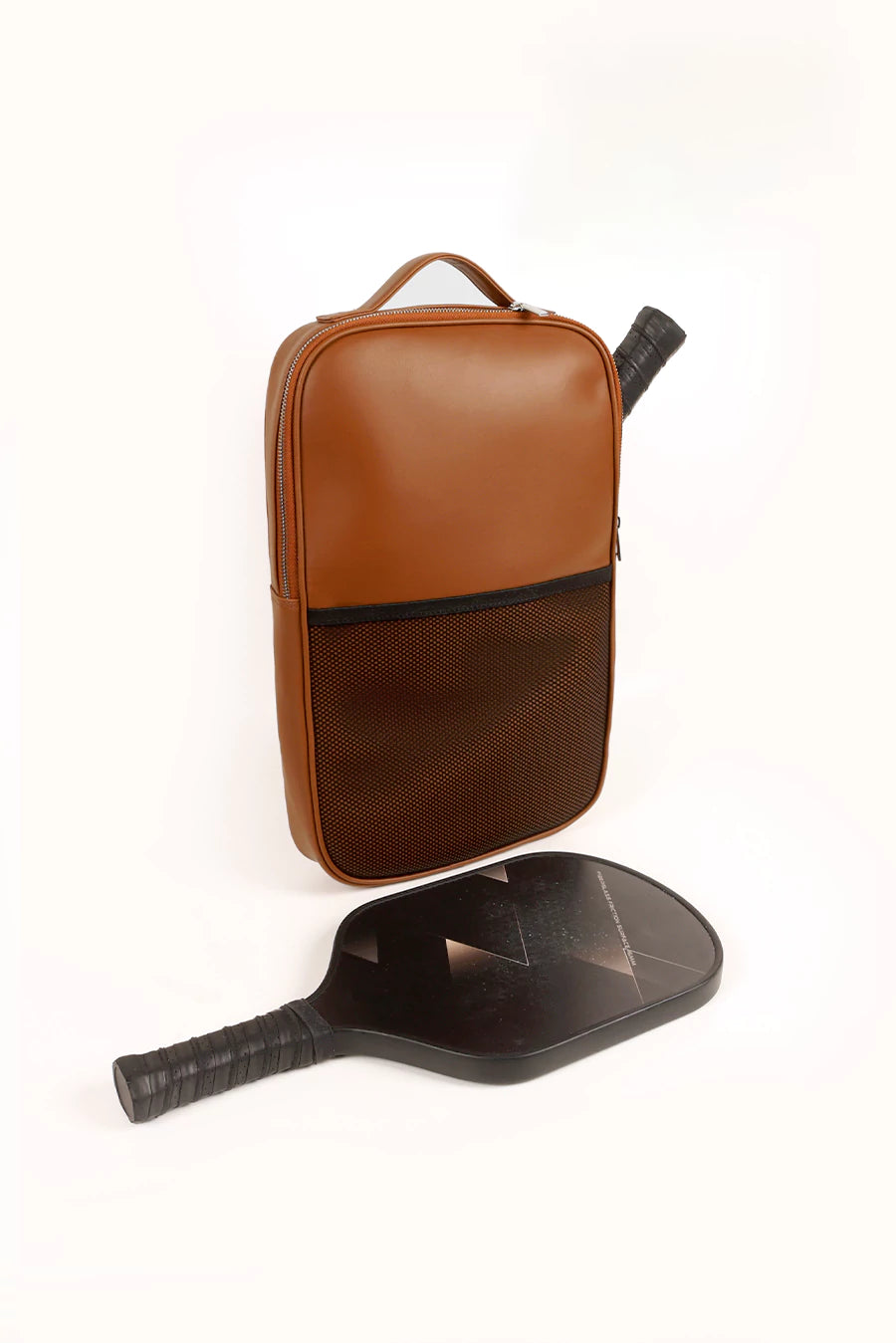 carry all your gaming gear in style in our cruelty free paddle bag tan lifestyle 1
