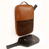 carry all your gaming gear in style in our cruelty free paddle bag tan lifestyle 1