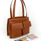 Carry all office essentials in cruelty free Barbara women office tote bag firepit lifestyle 1